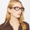 Brille mit durchbrochenem Rechteckrahmen Brille mit durchbrochenem Rechteckrahmen