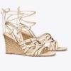 Espadrilles mit Keilabsatz und Korbgeflecht Espadrilles mit Keilabsatz und Korbgeflecht