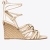 Espadrilles mit Keilabsatz und Korbgeflecht Espadrilles mit Keilabsatz und Korbgeflecht