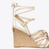 Espadrilles mit Keilabsatz und Korbgeflecht Espadrilles mit Keilabsatz und Korbgeflecht