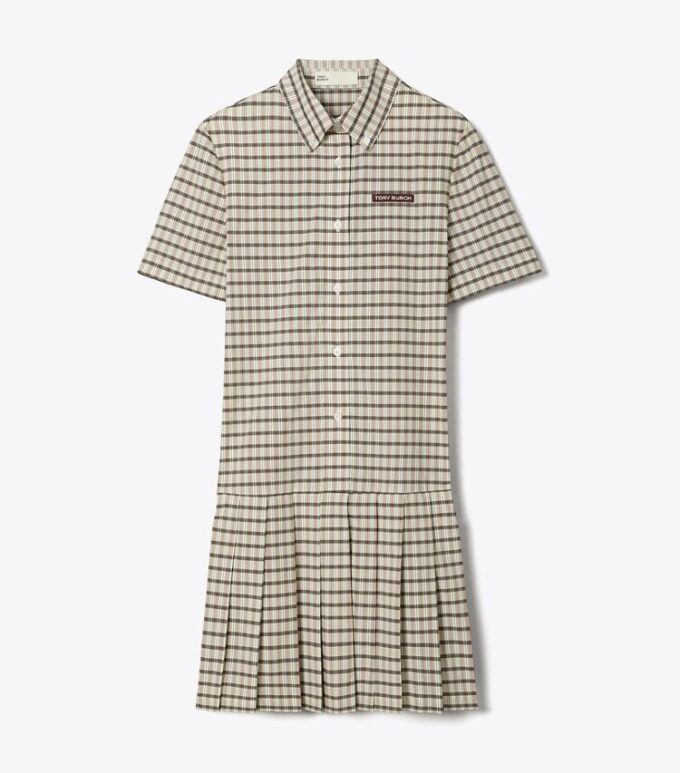 Golfkleid mit Karomuster, tiefem Taillenbund und Falten Golfkleid mit Karomuster, tiefem Taillenbund und Falten