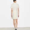 Kurzärmeliges Golfkleid mit Plissee Kurzärmeliges Golfkleid mit Plissee