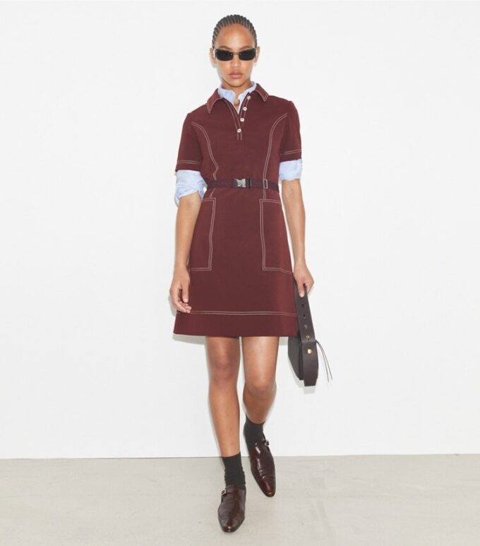 Kurzärmeliges Golfkleid mit Ziernähten Kurzärmeliges Golfkleid mit Ziernähten
