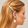 Logo-Haarspange mit Perlen Logo-Haarspange mit Perlen