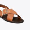 Sandalen mit gekreuzten Riemen Sandalen mit gekreuzten Riemen