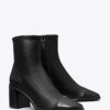 Stiefelette mit Kappe und Absatz Stiefelette mit Kappe und Absatz