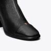 Stiefelette mit Kappe und Absatz Stiefelette mit Kappe und Absatz