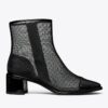 Stiefelette mit niedriger Ferse und Zehenkappe Stiefelette mit niedriger Ferse und Zehenkappe