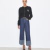 T Monogram Kontrast-Manschetten Straight-Leg-Jeans T Monogram Kontrast-Manschetten Straight-Leg-Jeans