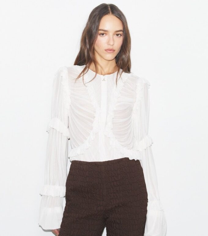Transparentes Jersey-Oberteil mit Rüschen Transparentes Jersey-Oberteil mit Rüschen