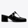 Violette Pantolette mit T-Riemchen und Absatz Violette Pantolette mit T-Riemchen und Absatz